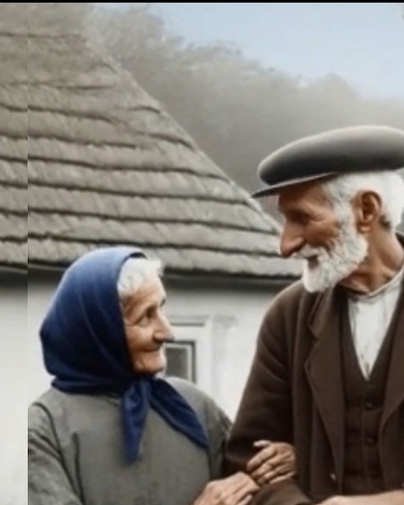 Colourised historical photograph of an older couple